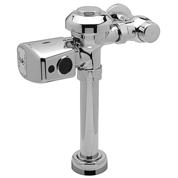 A close-up of a chrome-colored Zurn urinal flush valve.