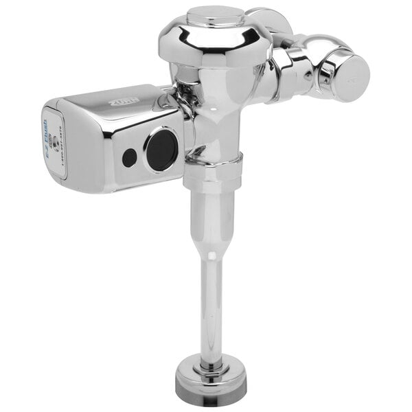 A Zurn chrome urinal flush valve with a battery powered sensor.