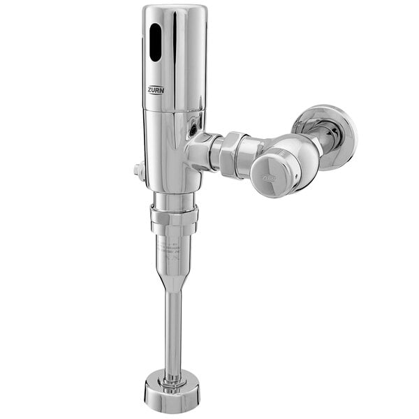 A Zurn chrome-plated metal urinal flush valve with a long life battery.