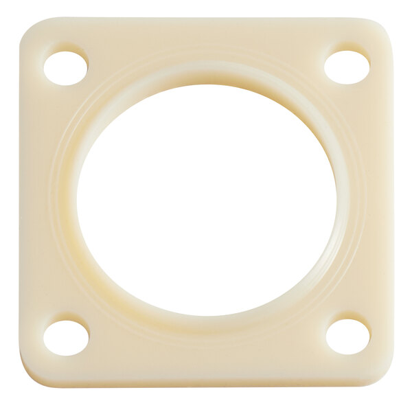 A white plastic circle with holes.