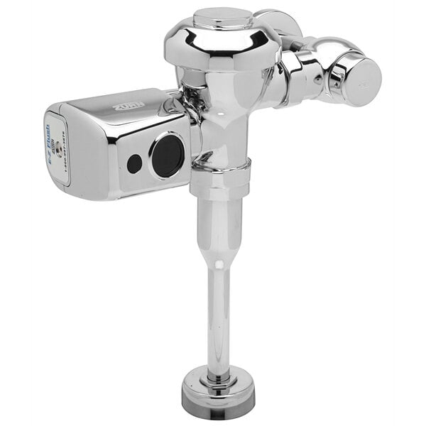 A chrome plated Zurn urinal with a battery powered sensor.