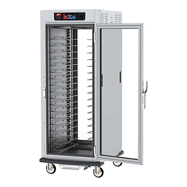 A large metal Metro C5 heated holding and proofing cabinet with clear glass doors and shelves.