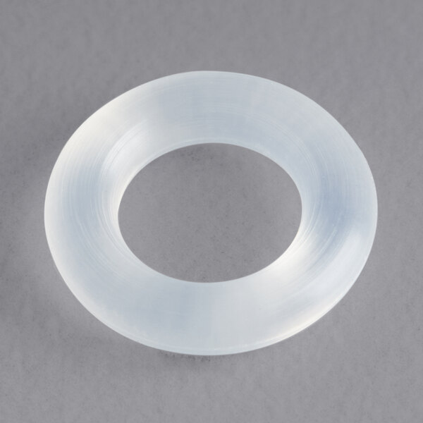 A white plastic ring with a grey center.