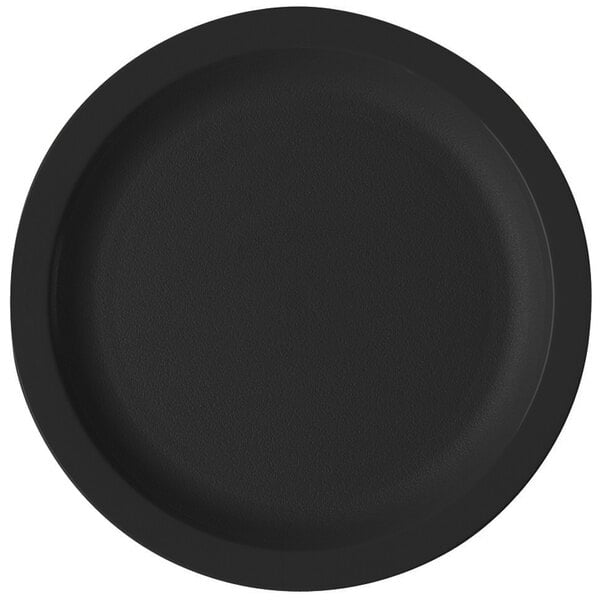 a black surface with a white object in the middle