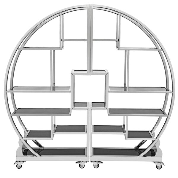 A stainless steel mobile buffet tower with shelves on wheels.
