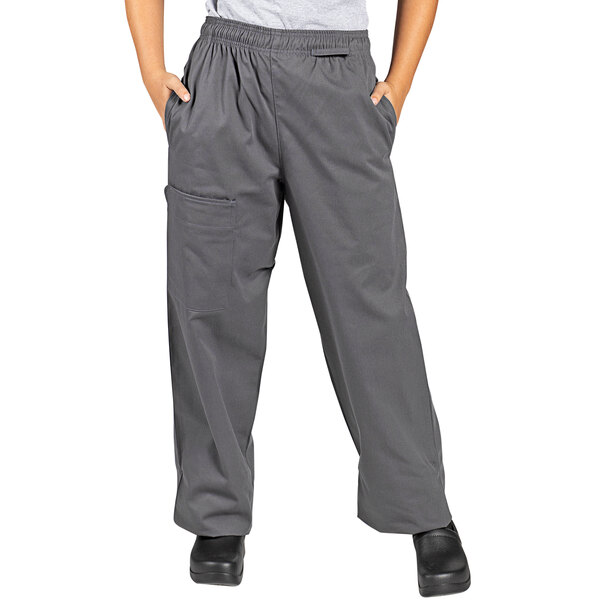 A person wearing Uncommon Cargo chef pants in slate gray.