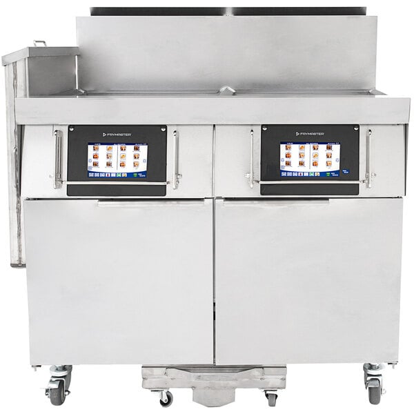 A Frymaster natural gas floor fryer with two frypots and automatic filtration.