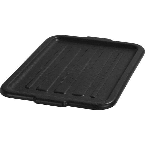 A black square pan with a lid.