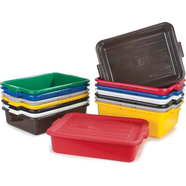 A stack of white Carlisle plastic food storage containers.