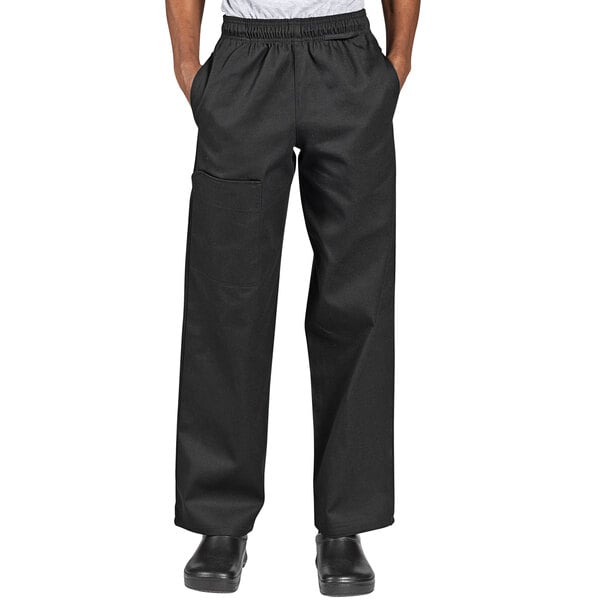 A person wearing Uncommon Chef black cargo pants.