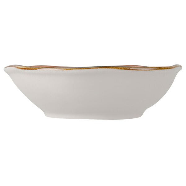 A Tuxton TuxTrendz China bowl with a white interior and gold rim.