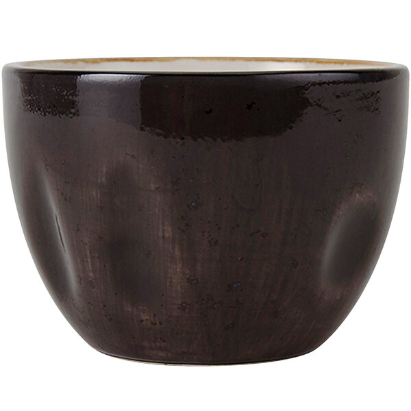 A black ceramic Tuxton bouillon cup with a white rim.