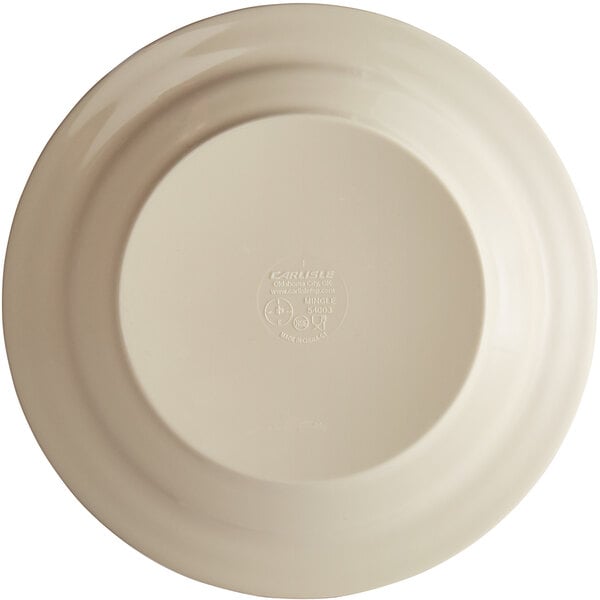 A white melamine soup bowl with a small design on the rim.