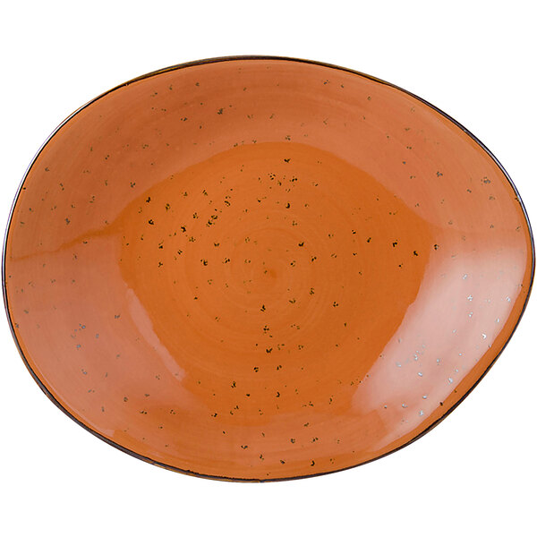 A white china ellipse plate with coral speckles.