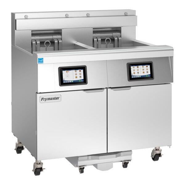 A commercial Frymaster electric floor fryer with two large frypots, digital controls, and a stainless steel exterior.