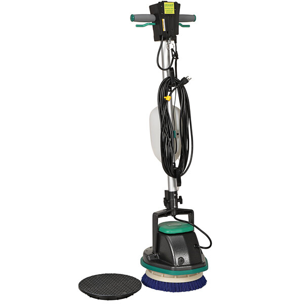 A Bissell Commercial floor machine with a green pad and a black base on a round base.
