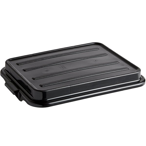 A Vollrath black high density polyethylene raised snap-on bus tub lid.