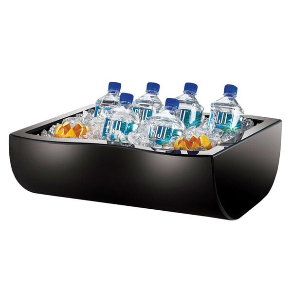 A black Cal-Mil insulated ice housing container with water bottles and ice inside.