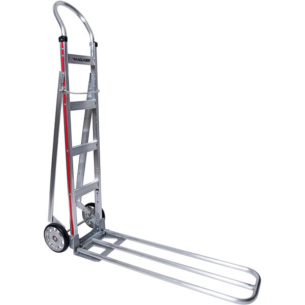 A silver Magliner hand truck with red wheels.
