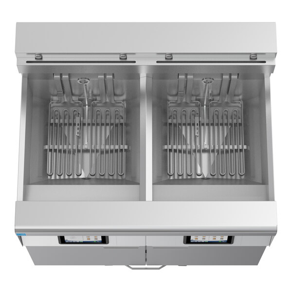 A commercial electric floor fryer with two large frypots and automatic filtration system.