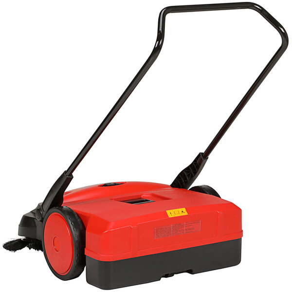 A red and black Bissell Commercial outdoor power sweeper.
