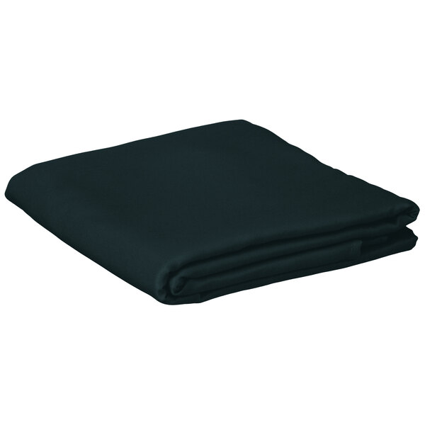 A folded hunter green cloth table cover.