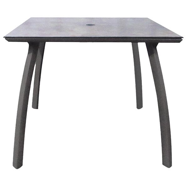 A Grosfillex square table with metal legs and a grey top.