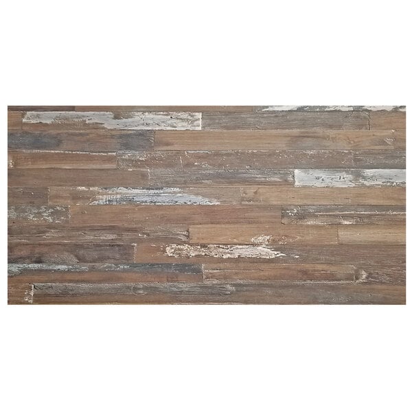 A wood surface with white paint designed to look like wood planks.