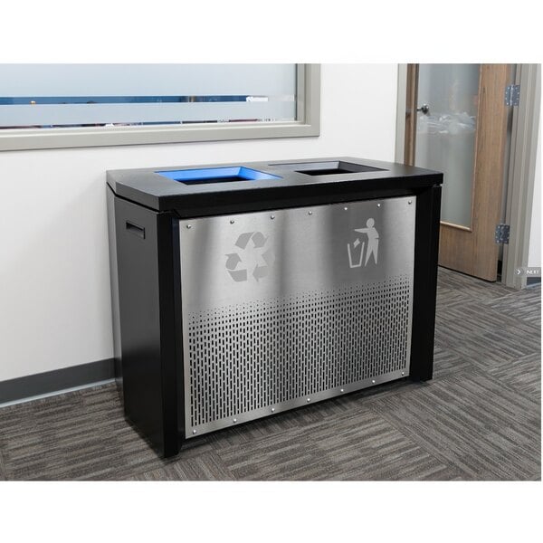 An Ex-Cell Kaiser black and silver metal rectangular two-stream recycling receptacle with a recycle symbol on it.