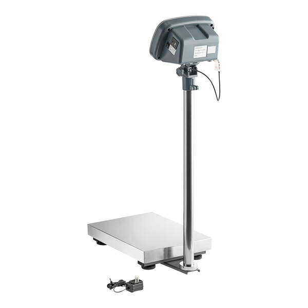A digital receiving bench scale with a tower display and power adapter.