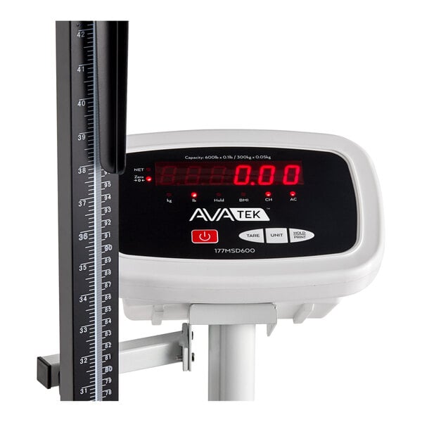 A digital physician's scale with a height rod and electronic display.