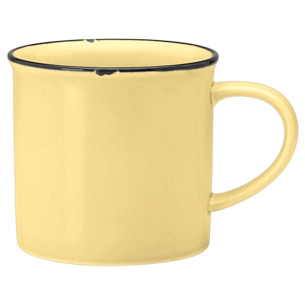 A Luzerne yellow porcelain mug with a black rim.