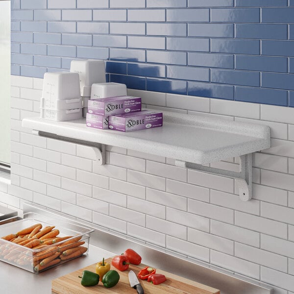 A white Cambro Camshelving wall shelf in a kitchen with purple boxes on it.