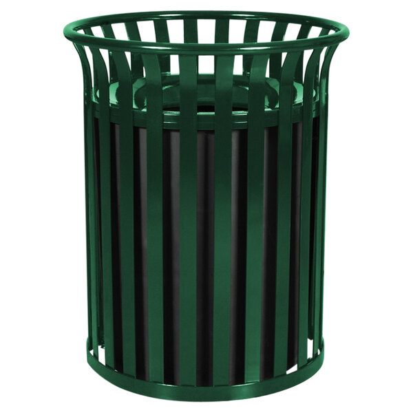 a green metal trash can