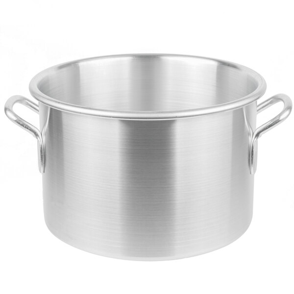 A silver pot with handles.