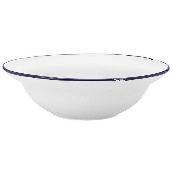 a white bowl with a blue rim