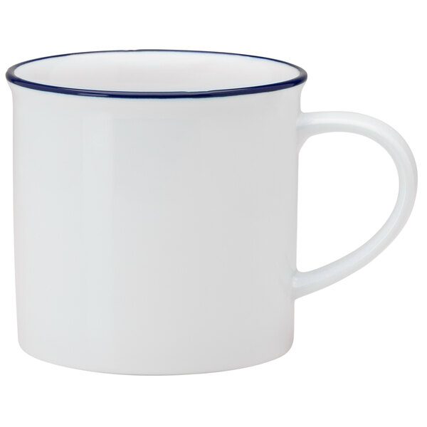 A white Luzerne Tin Tin porcelain coffee mug with a blue rim and handle.