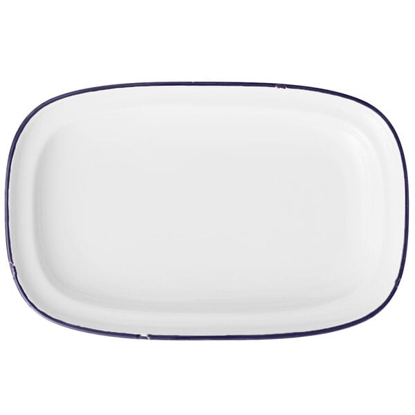 A white rectangular porcelain platter with a blue rim.