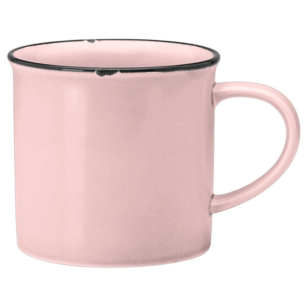 A Luzerne pink porcelain mug with a black rim and handle.