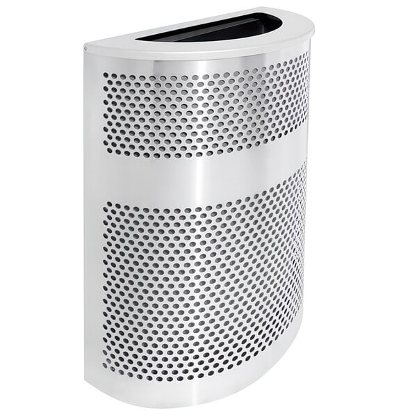 A close-up of a stainless steel half round waste receptacle with a platinum lid with holes in it.