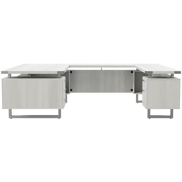 A white Safco Mirella U-shaped desk with storage drawers and a file drawer.