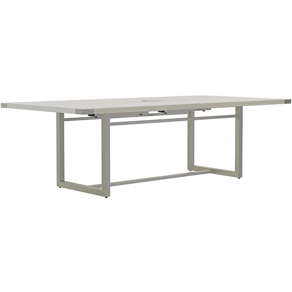A white Safco Mirella rectangular conference table with metal legs.