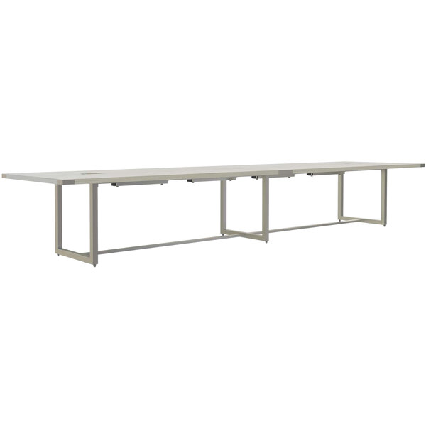 A white rectangular Safco Mirella conference table with four legs.