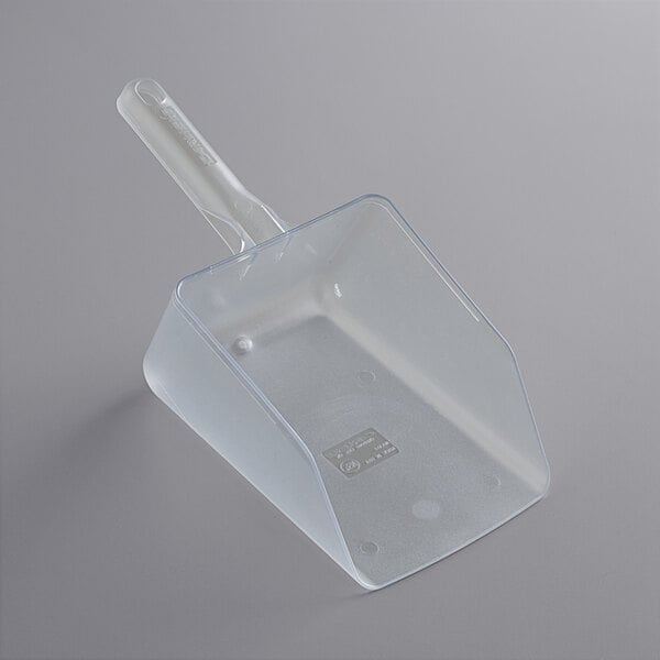 A clear plastic scoop with a handle.