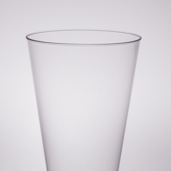 A clear plastic WNA Comet Pilsner cup.