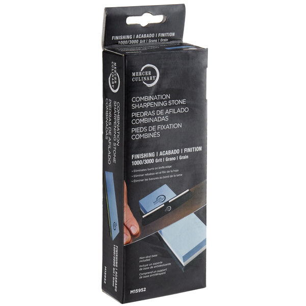 A box of Mercer Culinary Combination Sharpening Stone with 1000 and 3000 Grit on a counter.