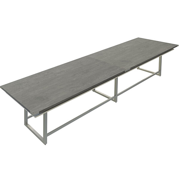 A Safco Mirella rectangular standing conference table with a stone gray metal frame.