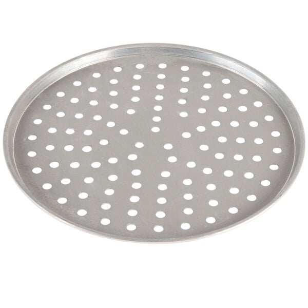 a round metal tray with holes