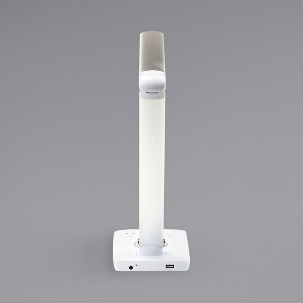 A white rectangular Safco Vamp LED desk lamp with a black circle around the base.