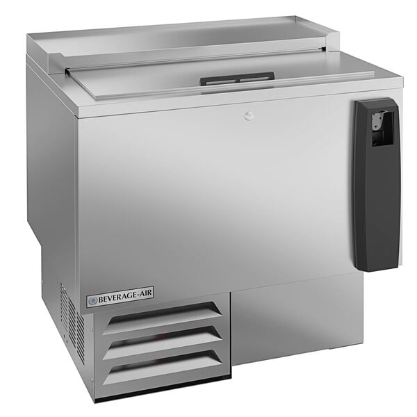 A Beverage-Air stainless steel shallow well bottle cooler with a door on top.